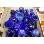 Blue glassware to include decanters, jugs, candlesticks.