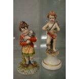 Two Capodimonte figures.