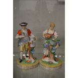 A pair of Dresden figures of a male and female gardener.