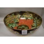 A Maling lustreware bowl.