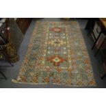 A Kilim style carpet, some wear and damage, 205cm x 135cm.