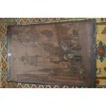 An Egyptian engraved and painted metal picture.