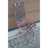 A wrought iron chair.