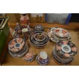 A good collection of late 19th century and later Imari porcelain to include numerous plates, bowls