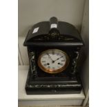A Victorian slate mantle clock.