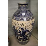A large classical style pottery vase.