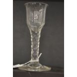 A large 18th century English glass with faceted cut stem.