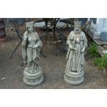 A good pair of reconstituted stone standing garden figures modelled as a king and queen.