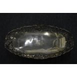 A good silver presentation rectangular shaped dish with pierced grape and vine border.
