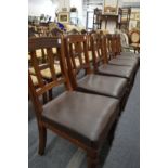 James Shoolbred & Co, a set of six Victorian walnut dining chairs.