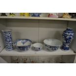 A group of Chinese blue and white porcelain to include a sleeve vase, baluster shaped vase and three
