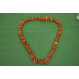 A good faceted amber bead necklace.