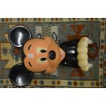 A painted fibre glass model of Mickey Mouse, probably from a fairground ride.