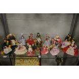 A good collection of Royal Doulton figures and figurines together with a Paragon china figurine.