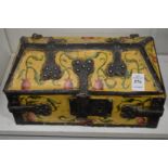 A decoratively painted wooden and wrought iron medieval style casket.