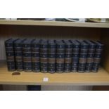 A set of twelve part leather bound volumes of the Waverley Novels.
