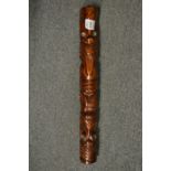 A New Zealand carved wood totem.