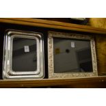 Two silver plated photograph frames.