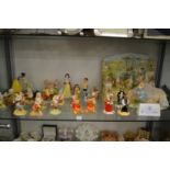 A good collection of Royal Doulton and Beswick Beatrice Potter Winnie the Pooh and Snow White