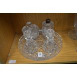 Cut glass circular dressing table tray with pair of candlesticks, perfume bottle and powder bowl and