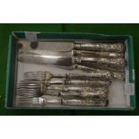 A set of six silver handled fruit knives and forks.