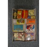 A small collection of advertising tins.