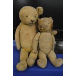 Two early, well loved teddy bears.