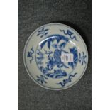 A Chinese blue and white saucer.