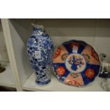 A Chinese blue and white baluster shaped vase (neck damaged), and an Imari plate.