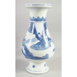 A CHINESE BLUE AND WHITE PORCELAIN VASE, painted with figures in a vase, 35.5cm high.