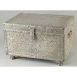 A FINE LARGE ISLAMIC SILVER OVERLAID WOODEN CASKET, with hinged cover, carrying handles and raised