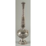 A FINE ISLAMIC SILVER ROSEWATER SPRINKLER, of typical form, with embossed and chased floral, leaf