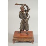 A FINE JAPANESE BRONZE OKIMONO of a warrior, signed Miyao Zo, mounted to a wooden base, 19.5cm