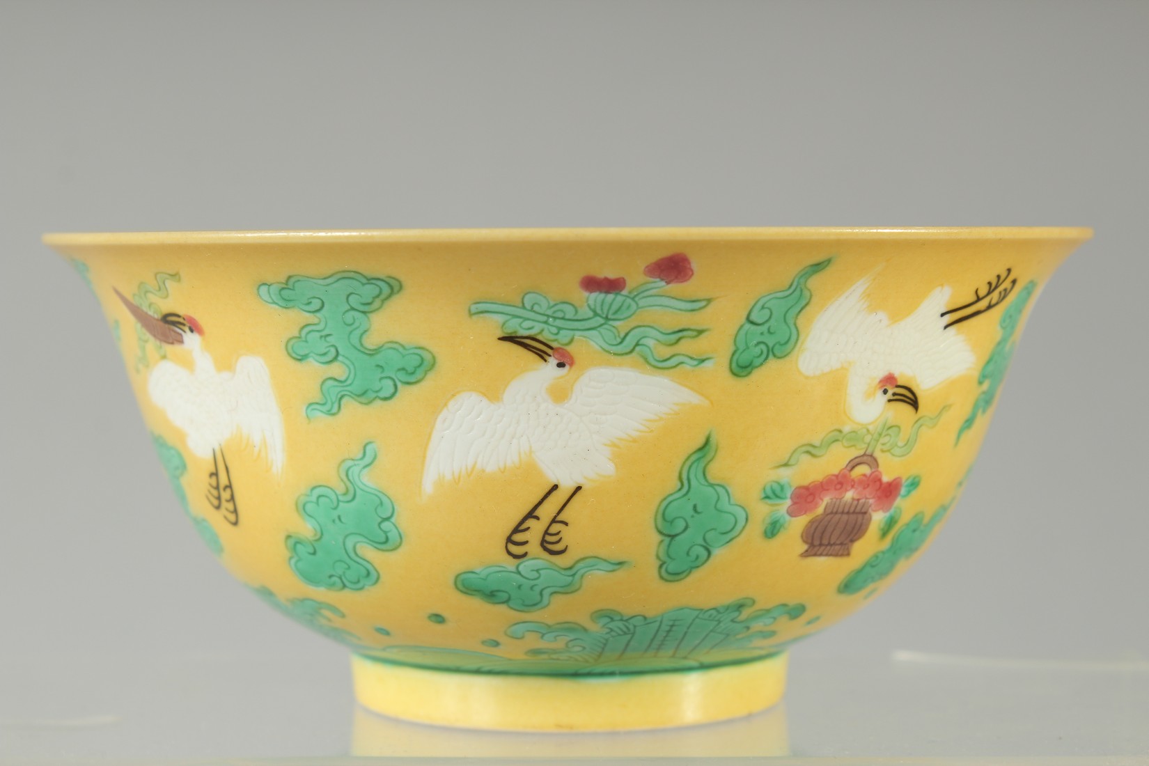 A CHINESE YELLOW GROUND ENAMELLED CRANE BOWL, with longevity symbol to interior and character mark - Image 2 of 7