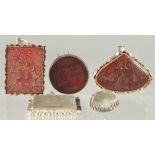 A FINE COLLECTION OF FIVE ISLAMIC SEALS, various stones, the two larger seals with lions and