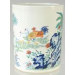 A CHINESE DOUCAI PORCELAIN BRUSH POT, painted with chickens, character mark to base, 16cm high.