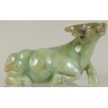 A LARGE CHINESE CARVED JADE BULL, 21cm long.