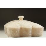 A FINE ADVENTRINE OR ROCK CRYSTAL LEAF-FORM LIDDED BOX, the lid and sides carved with foliate