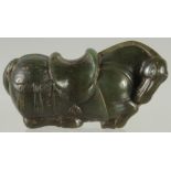 A GREEN HARDSTONE FIGURE OF A HORSE, 7cm long.