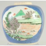 A CHINESE BLUE GROUND FAMILLE VERTE PORCELAIN JAR, painted with a panel of a landscape and another