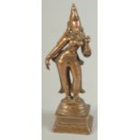 A FINE 17TH CENTURY SOUTH INDIAN BRONZE FIGURE OF A FEMALE DEITY, 10cm high.