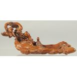 A VERY FINE CHINESE BOXWOOD CARVING, depicting a miniature naturalistic scene with a seated