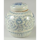 A CHINESE BLUE AND WHITE PORCELAIN JAR AND COVER, decorated with floral motifs, 16cm high.