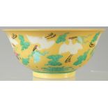 A CHINESE YELLOW GROUND ENAMELLED CRANE BOWL, with longevity symbol to interior and character mark