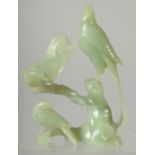 A CHINESE CARVED JADE BIRD GROUP on hardwood stand, 21cm high overall.