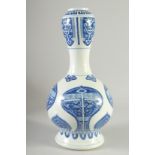 A 19TH CENTURY CHINESE BLUE AND WHITE PORCELAIN GARLIC HEAD VASE, painted with archaic-style motifs,