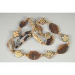 AN AGATE AND DZI BEAD NECKLACE.