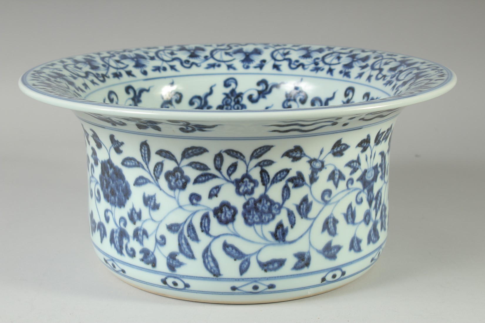 A CHINESE BLUE AND WHITE PORCELAIN WATER BASIN, the interior with auspicious symbols and lotus, 31.