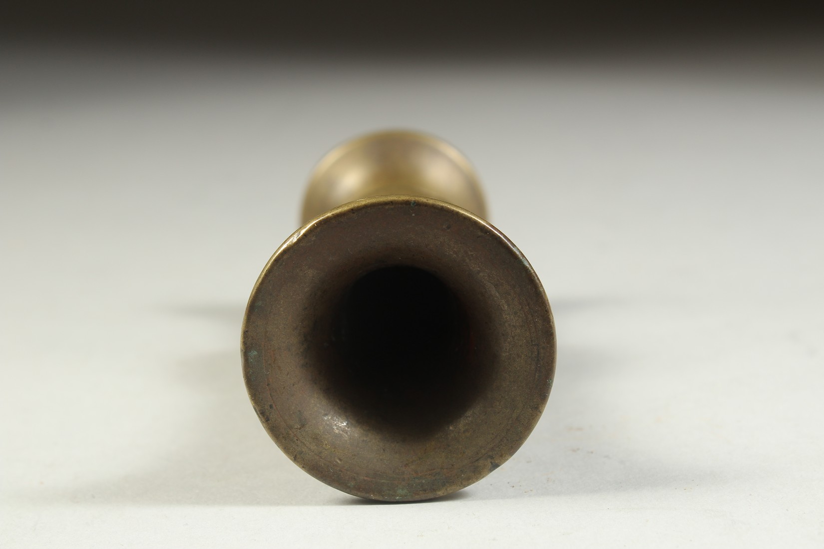 A SMALL CHINESE BRASS GU SHAPE VASE, 10cm high. - Image 3 of 4