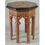 A 19TH CENTURY MOORISH POSSIBLY SPANISH (ALLA CERTOSINA TYPE) BONE INLAID TABLE, 48cm high.